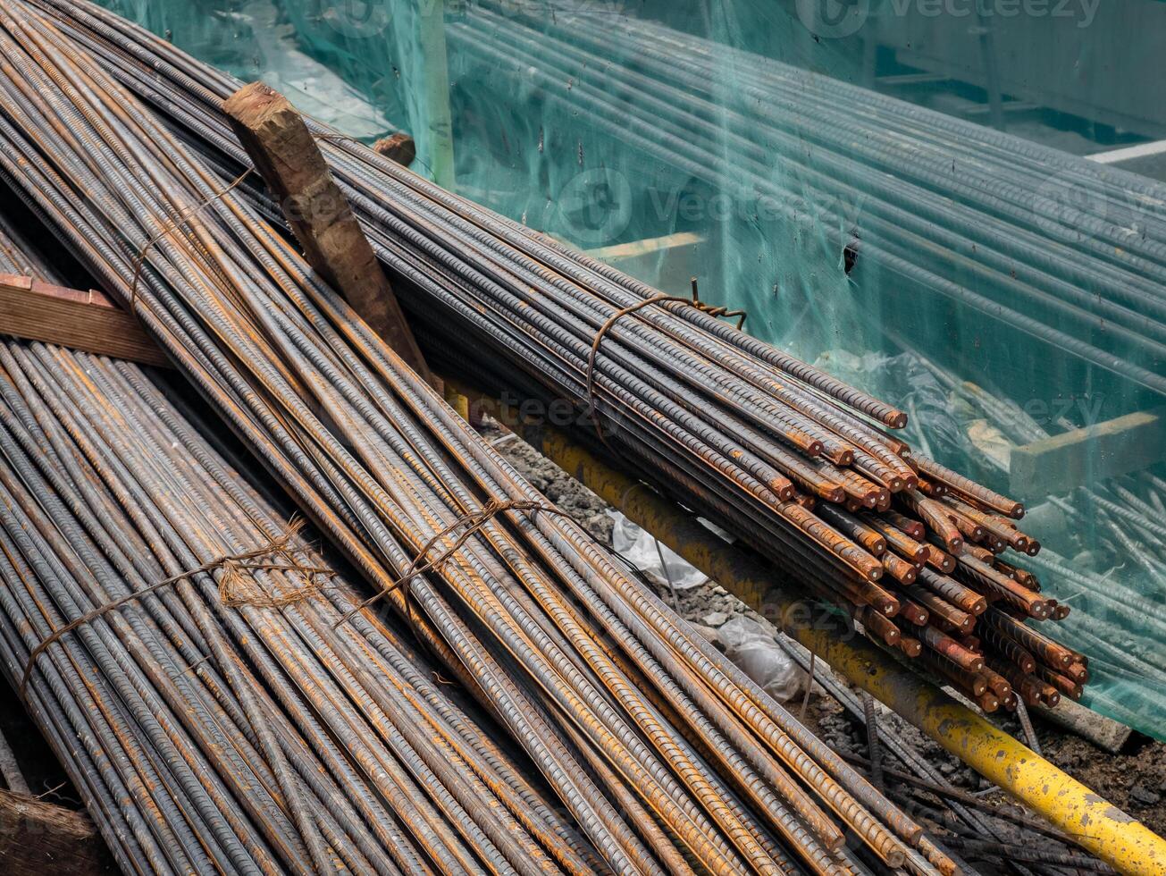 pile of steel bar at a building work site photo