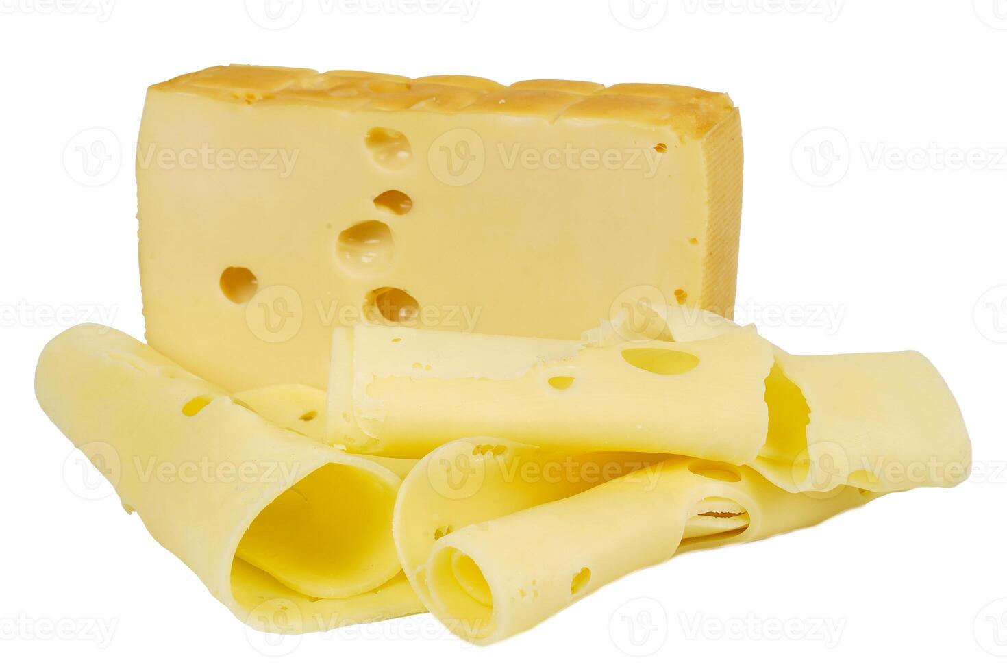 Big piece of perforated cheese. Sliced cheese with small slices. photo