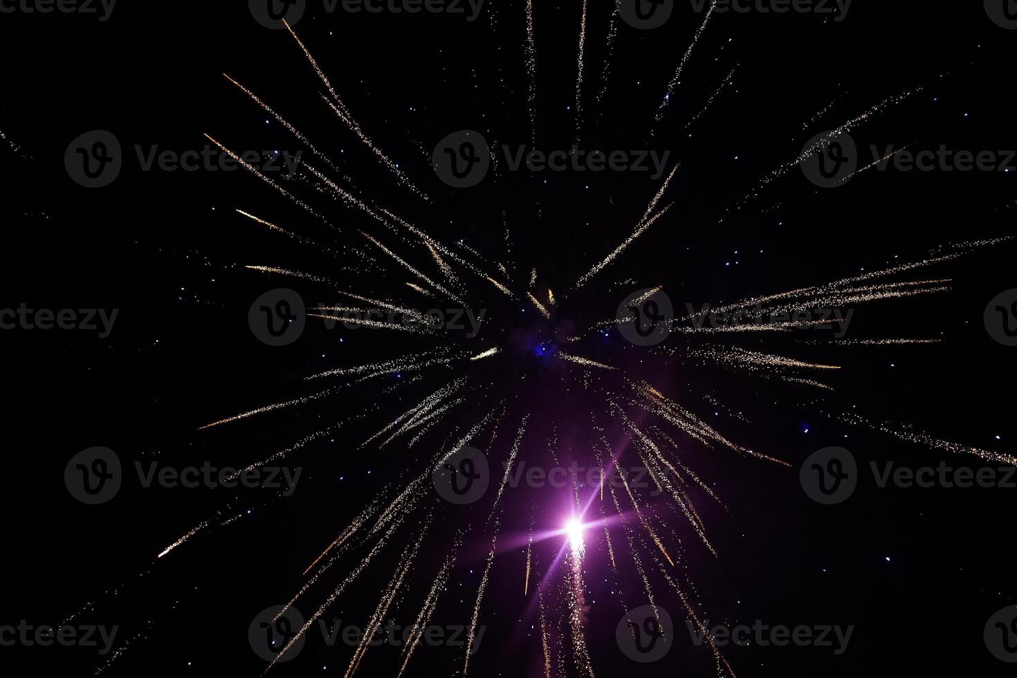 Fireworks in the sky. Colorful night sky during the new years eve. Fireworks display. photo