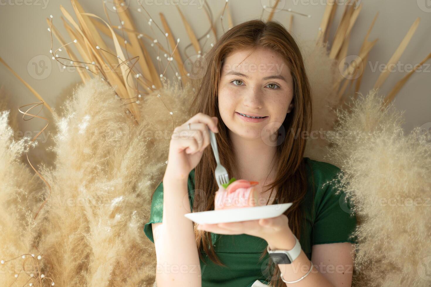 Portrait of Teenage girl with braces in picture frame photo