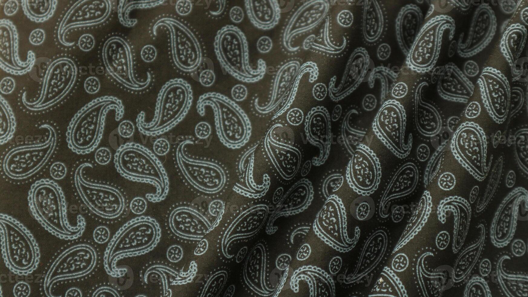 A traditional Indonesian fabric, namely batik cloth which has unique and different patterns and image motifs for each region. Cultural theme photos, typical of Asia.A traditional Indonesian fabric photo