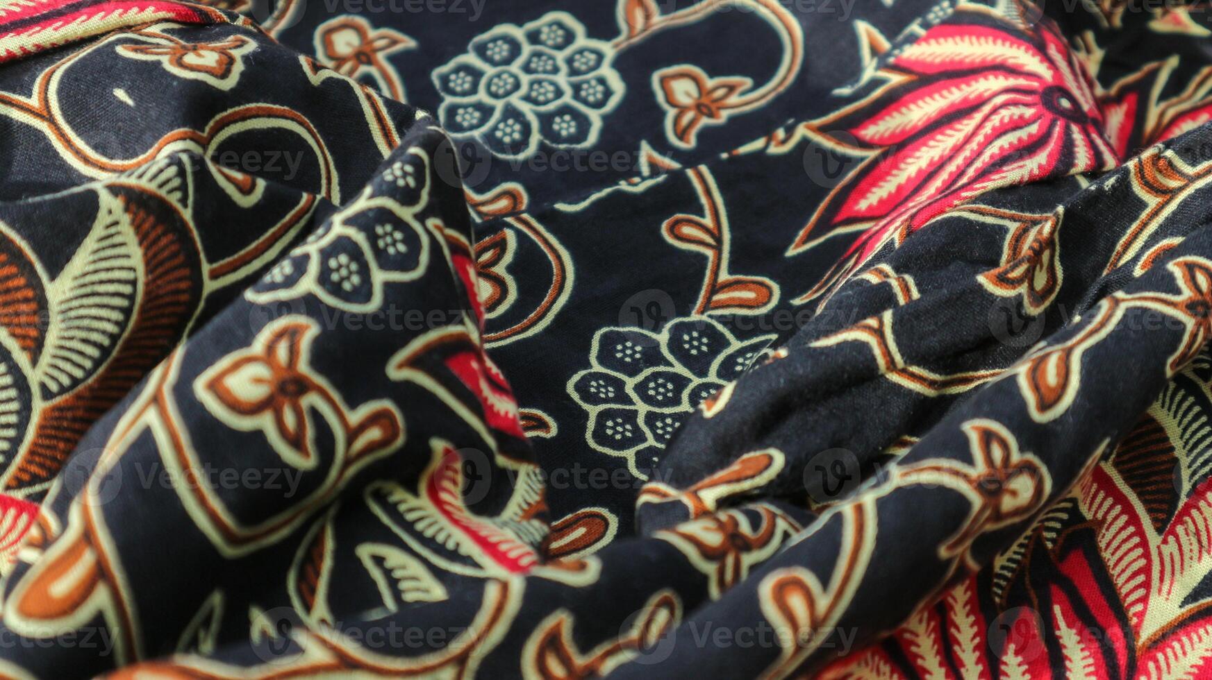 A traditional Indonesian fabric, namely batik cloth which has unique and different patterns and image motifs for each region. Cultural theme photos, typical of Asia. photo