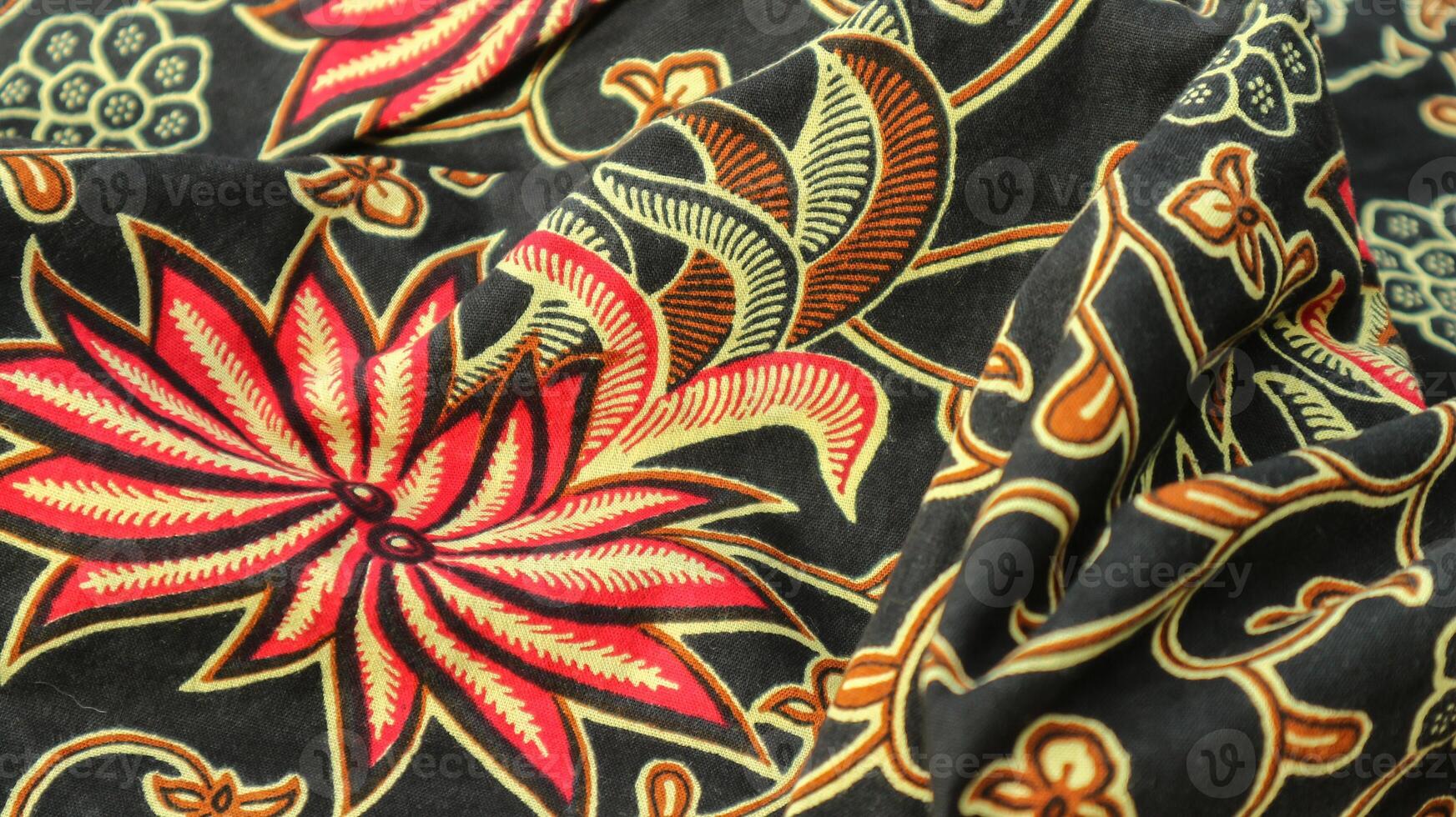 A traditional Indonesian fabric, namely batik cloth which has unique and different patterns and image motifs for each region. Cultural theme photos, typical of Asia. photo