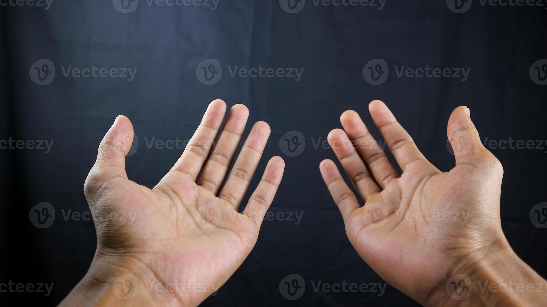 Praying hands with faith in religion and belief in God on blessing background. Power of hope or love and devotion. photo