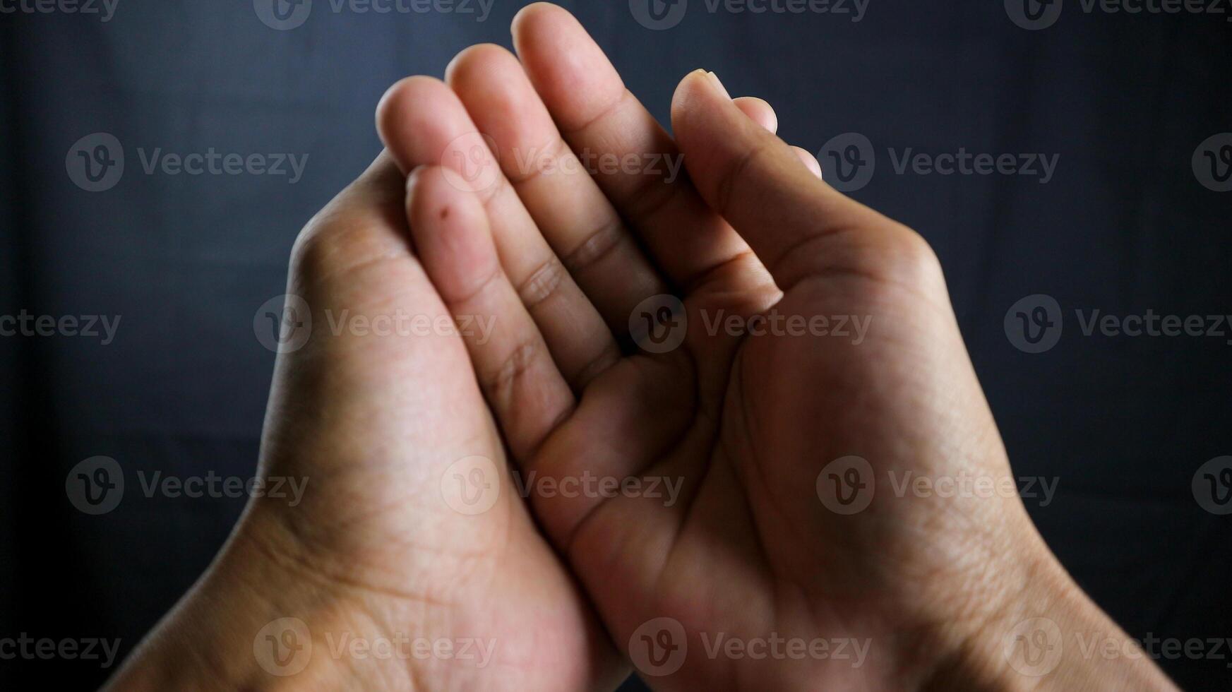 Praying hands with faith in religion and belief in God on blessing background. Power of hope or love and devotion. photo