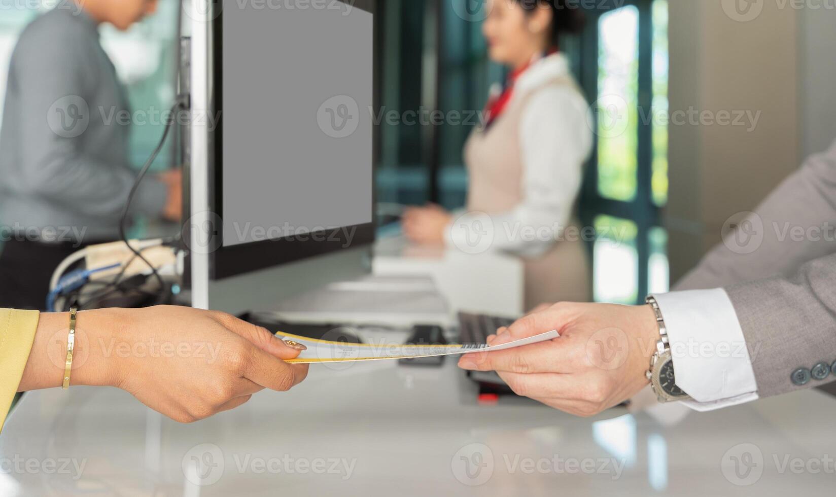 Airport check in counter with boarding pass ticket photo