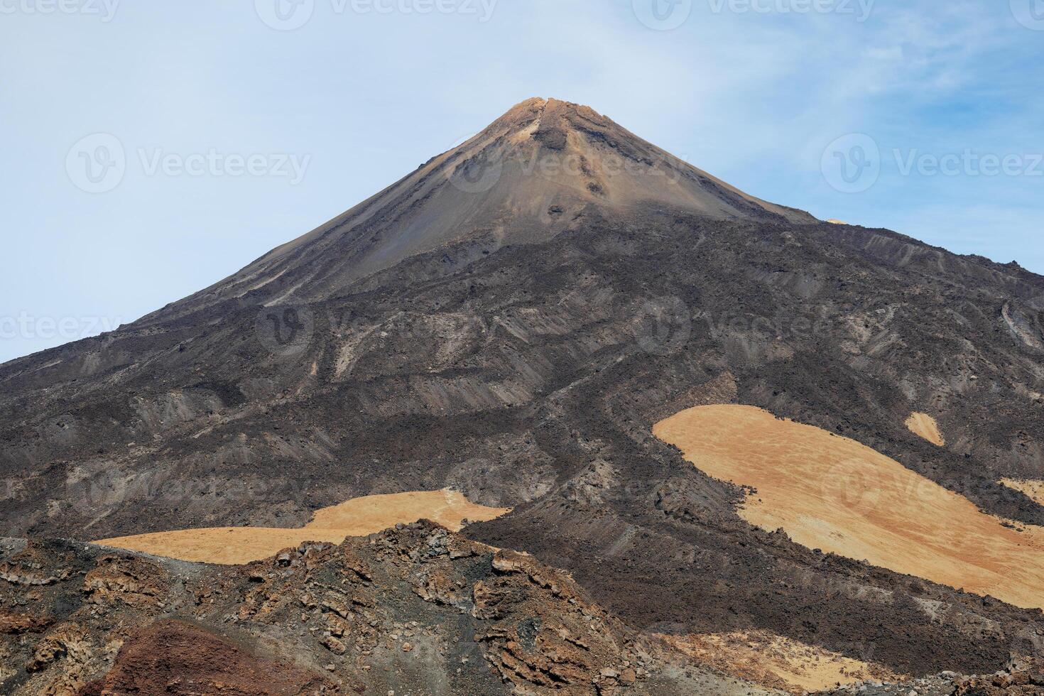 View of Mount Teide, the highest mountain of Spain situated in the Canary Islands, Spain. Famous destinations for hikers. Teide National Park, Unesco World Heritage Site. photo