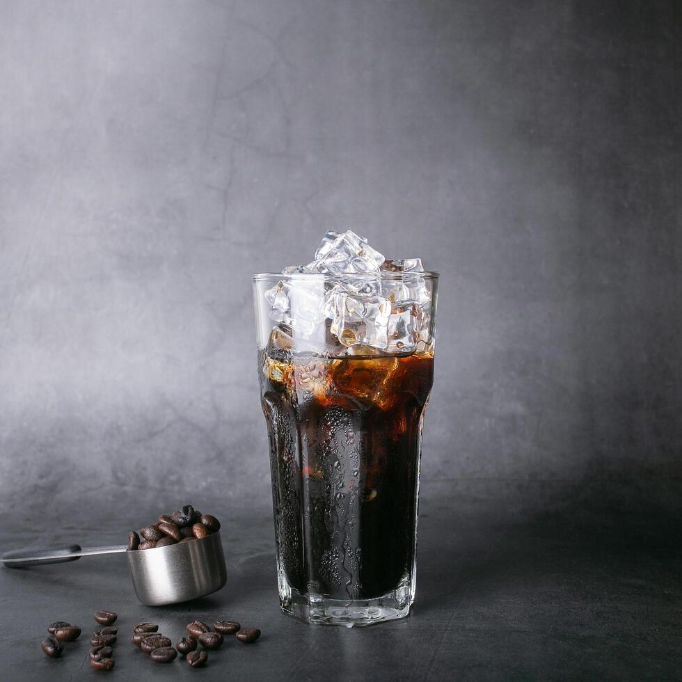 Americano iced coffee, menu coffee and roasted beans, coffee in a square spoon, background photo