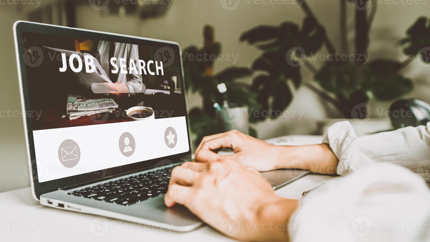 Asian man hand using the keyboard to search job browsing work opportunities online on web job search websites. Search, laptop screen, recruitment concept. photo