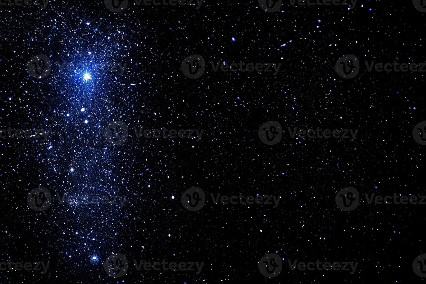 Starry sky background with bright stars in dark night sky photo