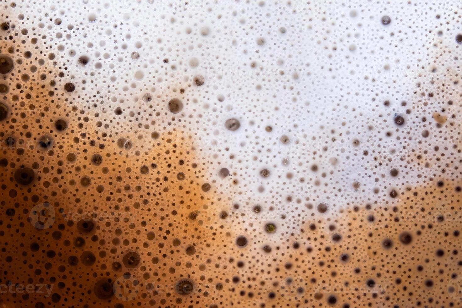 Surface texture of hot milk coffee and soft froth photo