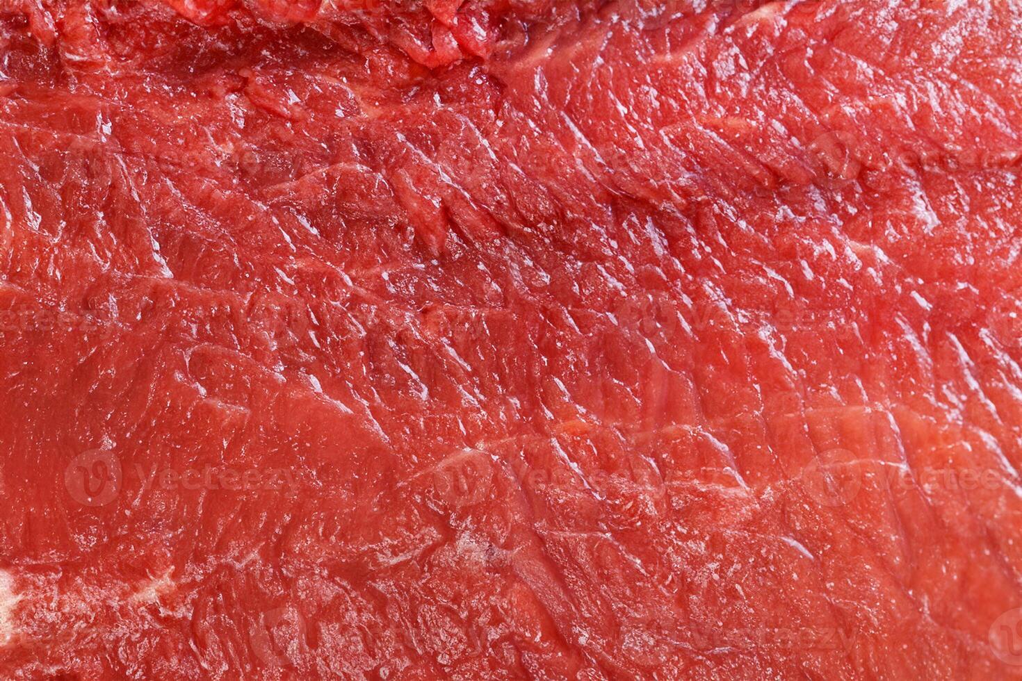 Raw red beef meat macro texture or background photo