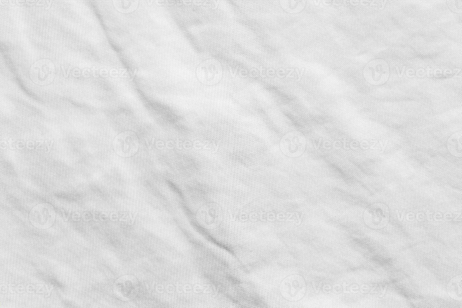 fondo de patrón de textura de tela de tela de camisa de algodón arrugado blanco foto