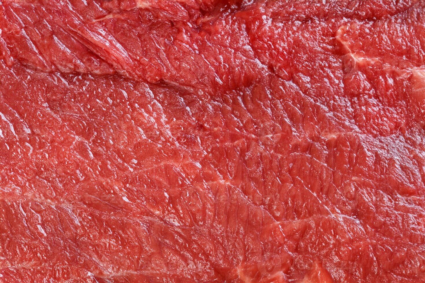 Raw red beef meat macro texture or background photo