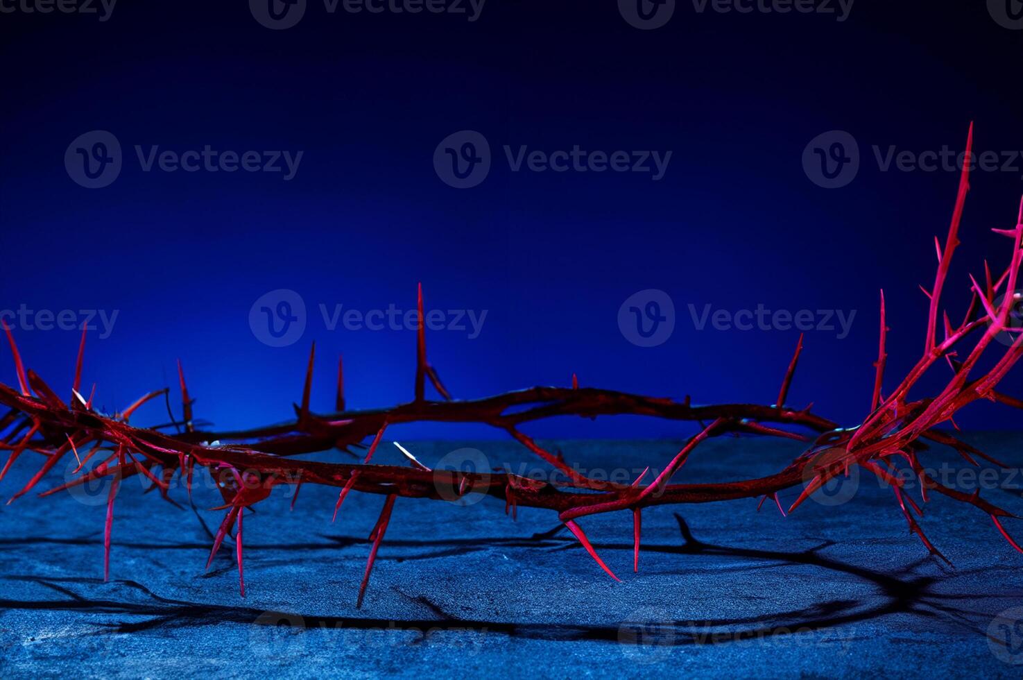 Crown of thorns on dark background photo