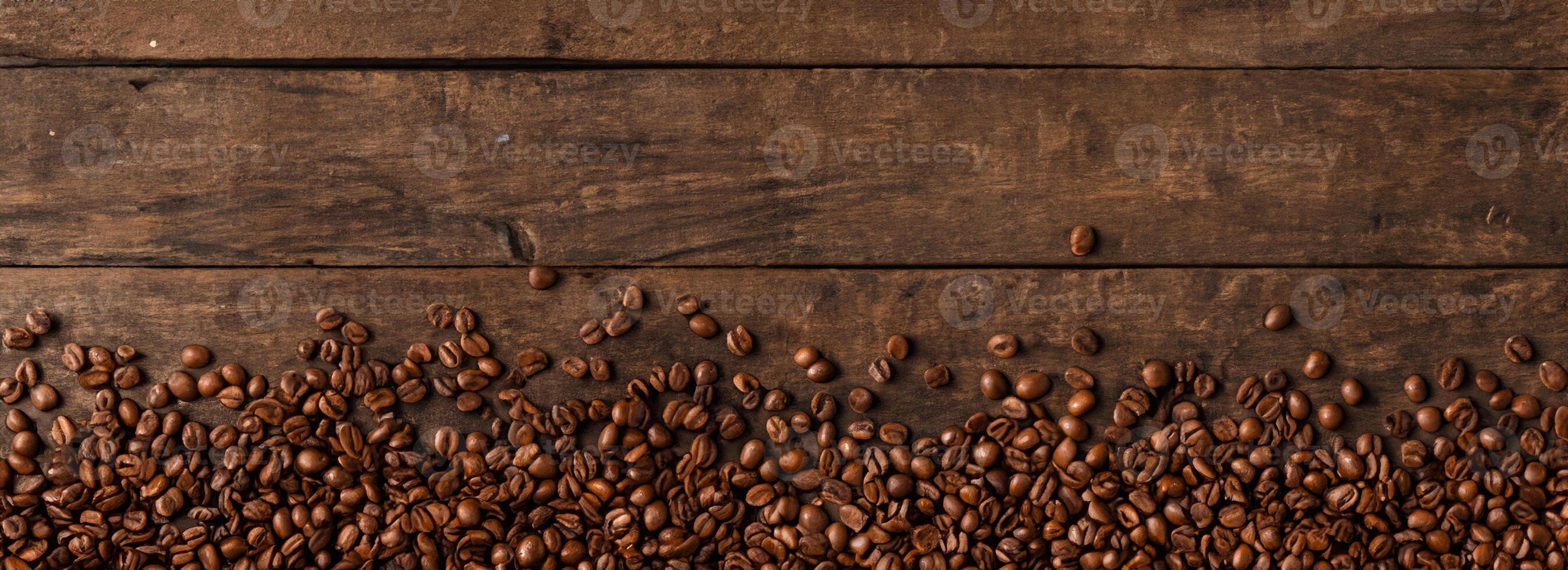 Coffee beans on wooden background with copyspace. photo