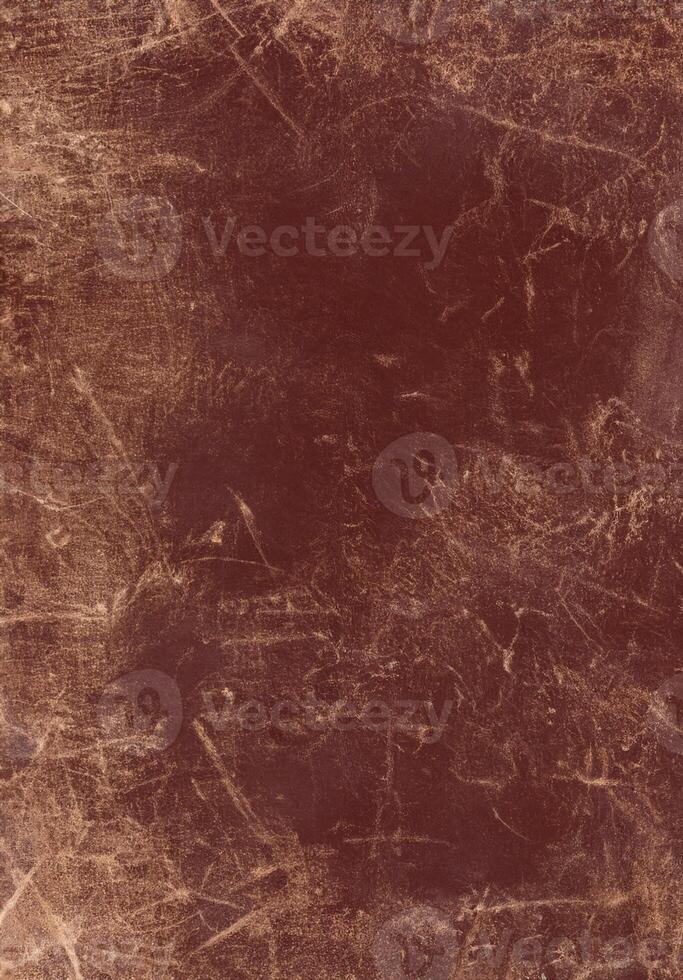 old scratched worn brown leather background and texture photo