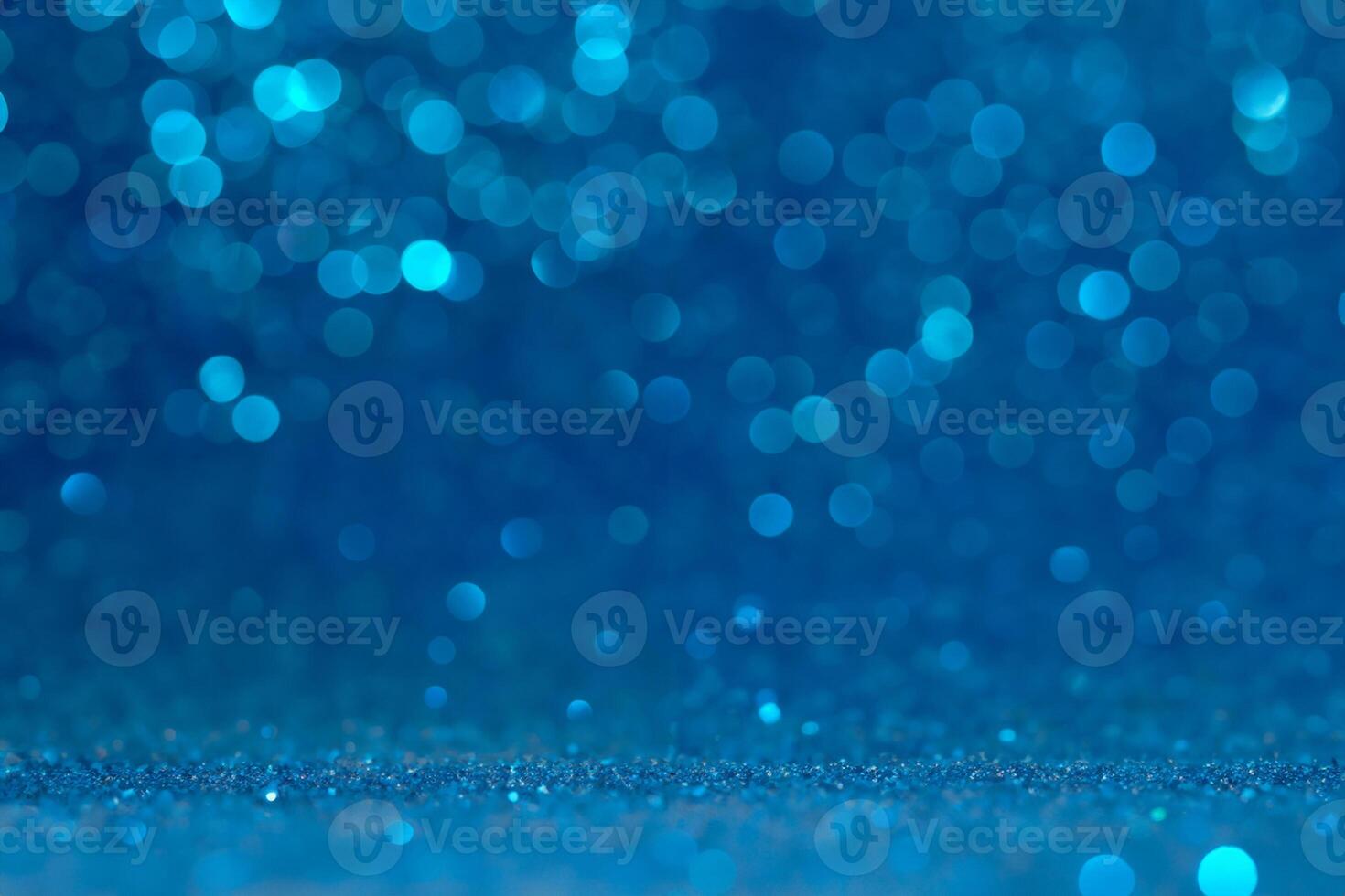 blue glitter background with sparkles photo