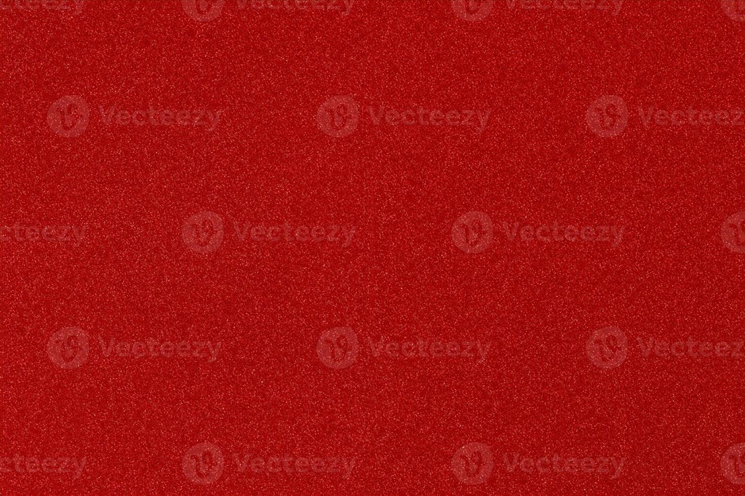 red Christmas background with shiny color speckles photo