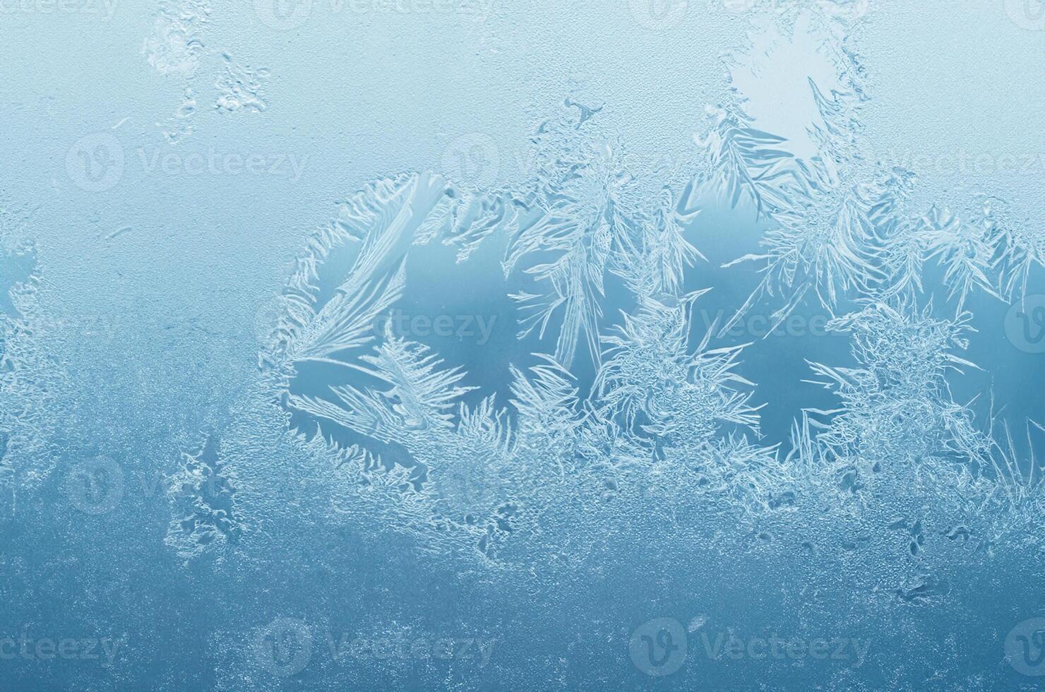 Abstract frosty pattern on glass, background texture photo