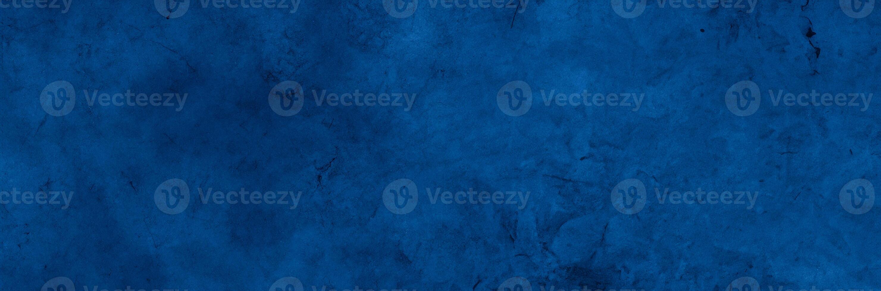 Old wall pattern texture cement blue dark abstract  blue color design are light with black gradient background. photo