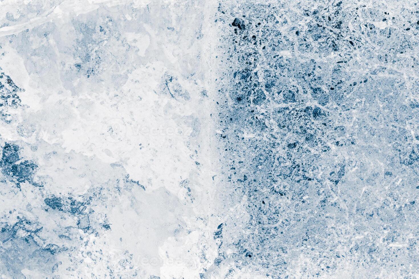 Ice blocks surface, blue toned. Ice texture background. Textured cold frosty surface of ice blocks. photo