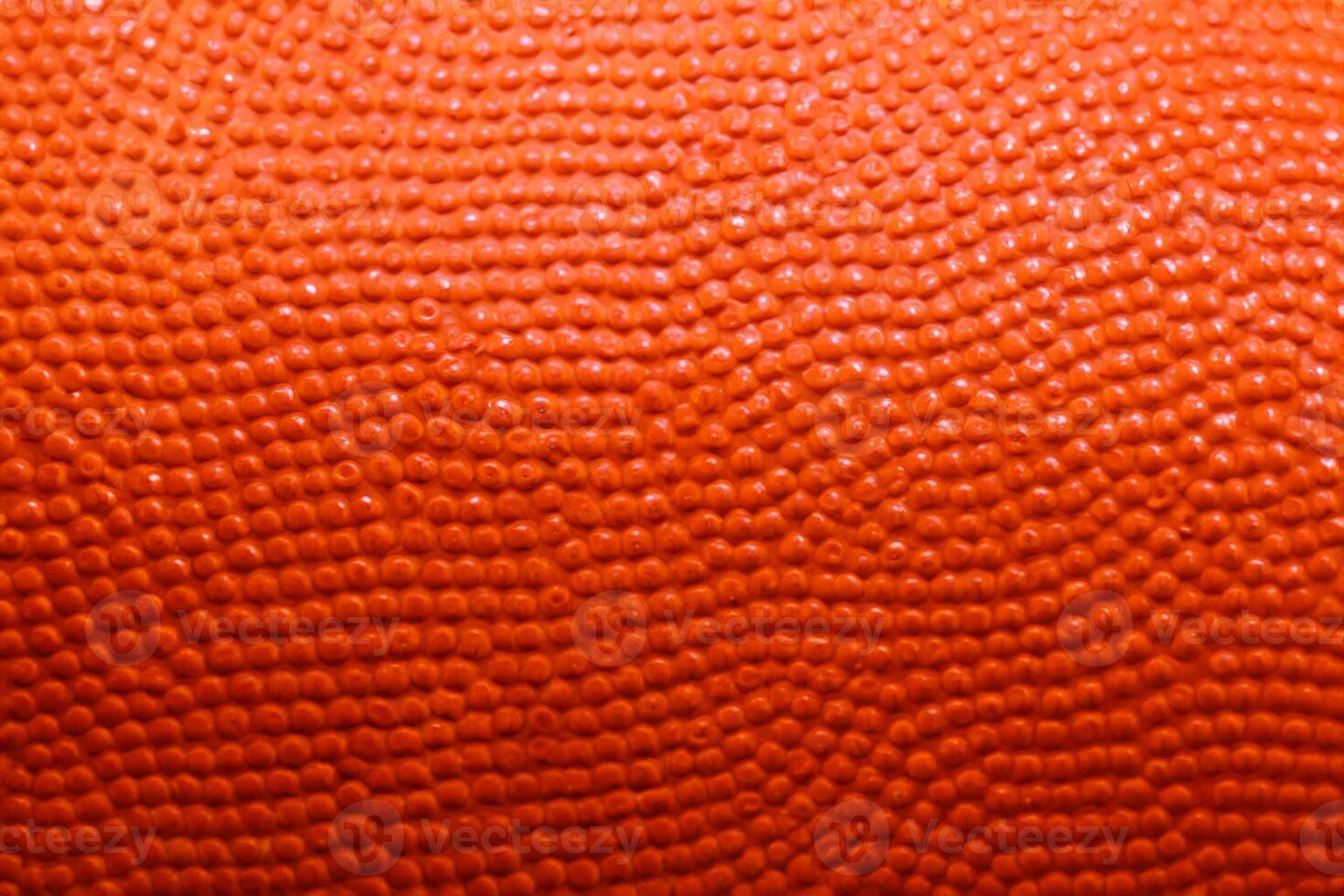 Close-up of orange basketball texture background photo