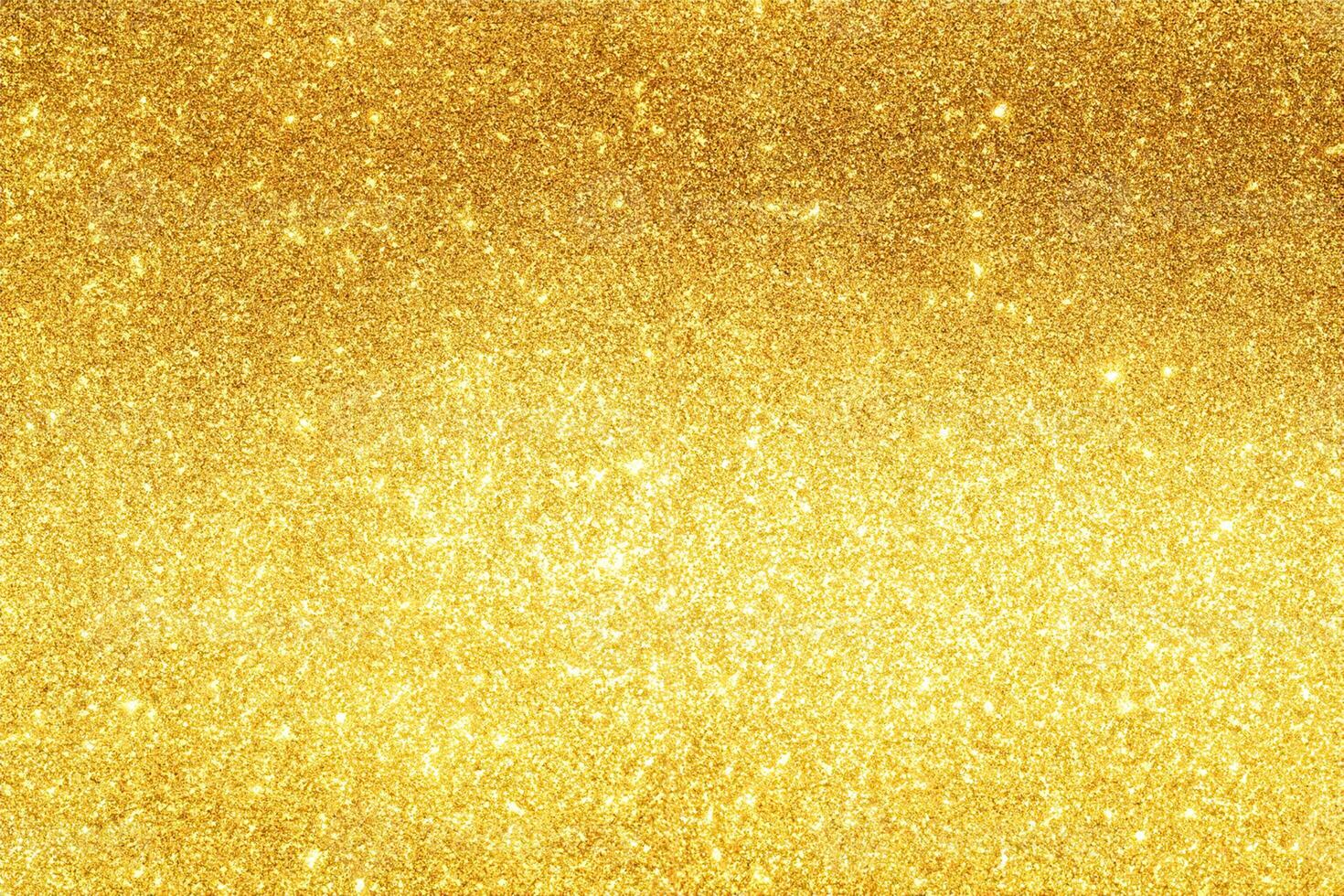 gold Sparkling Lights Festive background with texture. Abstract Christmas twinkled bright bokeh defocused and Falling stars. Winter Card or invitation photo