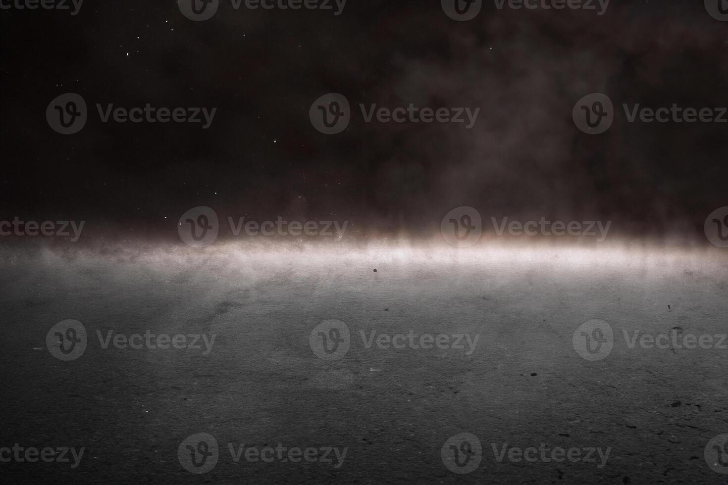 Concrete floor with smoke and light photo