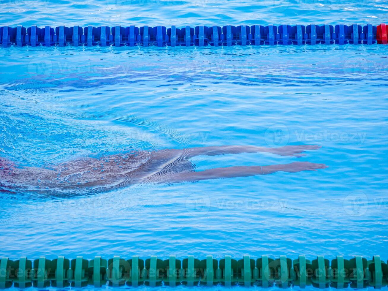 Young man in the swimming. photo