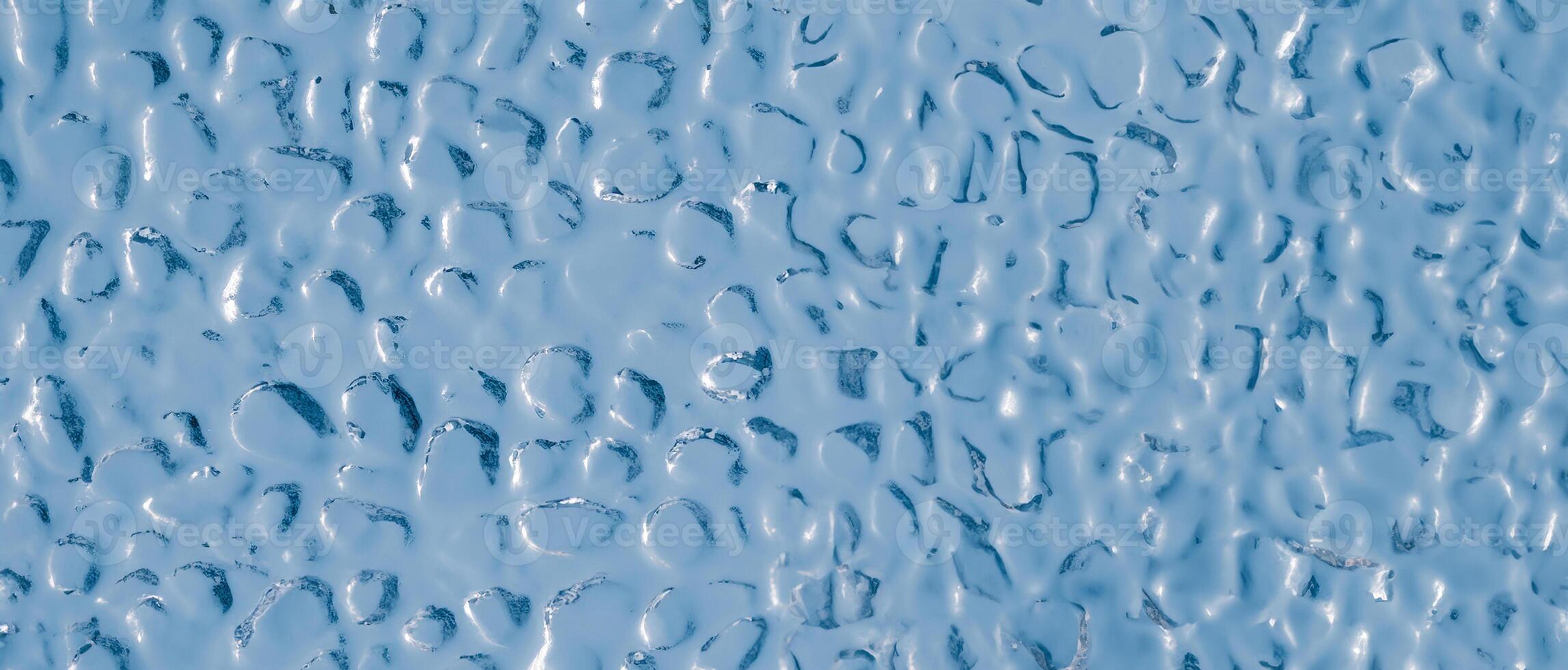 Background of uneven convex glass texture with ripple effect, water or ice imitation. photo