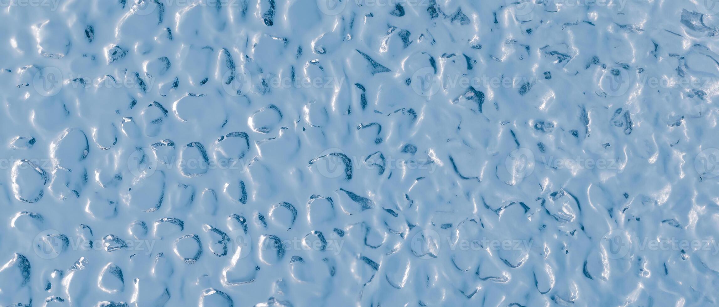 Background of uneven convex glass texture with ripple effect, water or ice imitation. photo