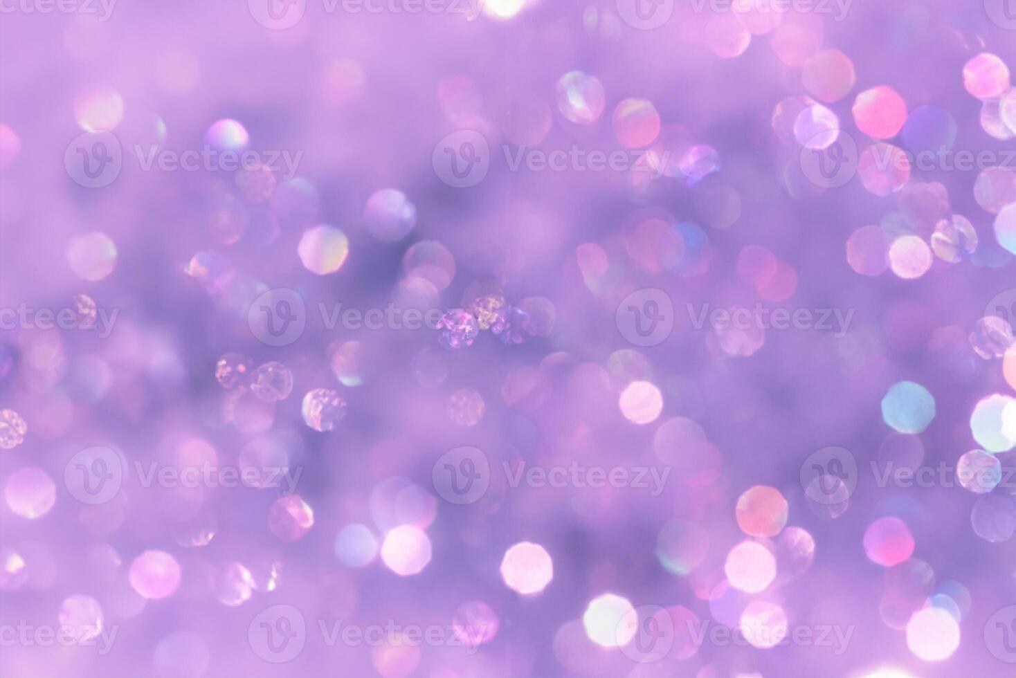 violet blurred background with bokeh lights photo