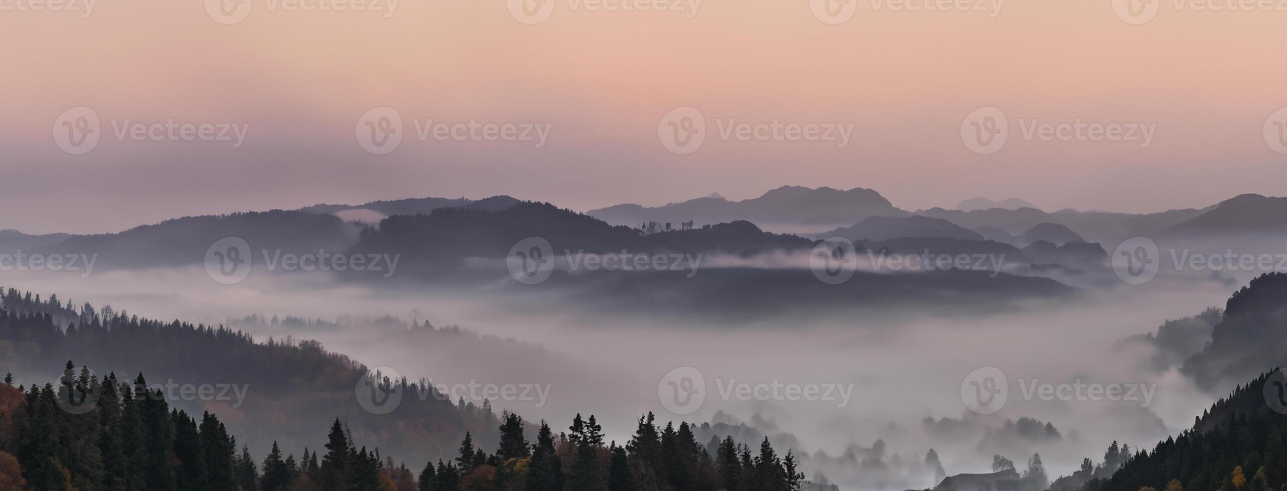 Panoramic foggy landscape at dawn over mountain and valley photo