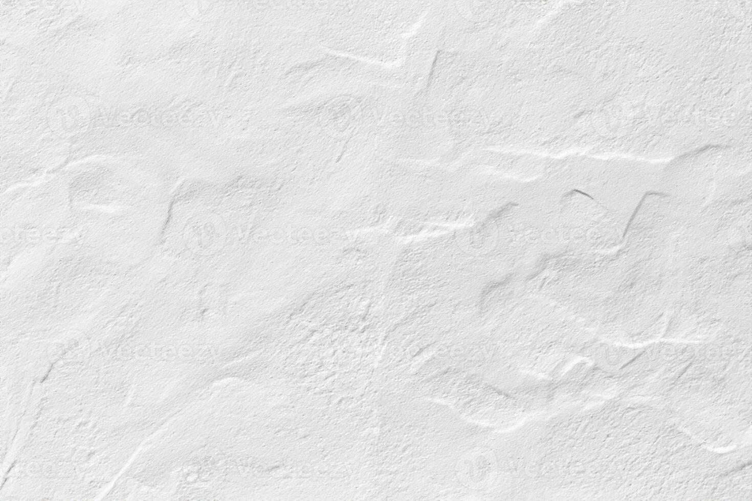 white plaster wall in rough structure photo