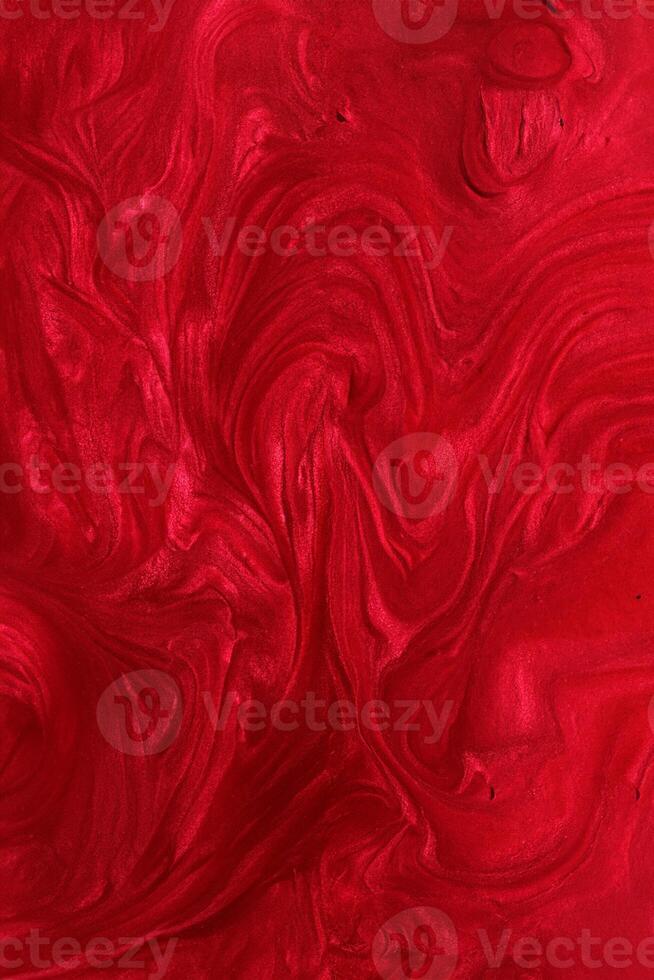 Vertical red shimmer abstract background. Make up concept.Beautiful stains of liquid nail laquers.Fluid art,pour painting technique.Horizontal banner,can be used as backdrop for chat. photo