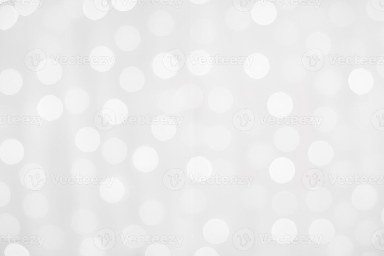 Blur photo of White christmas background with bokeh lights and snowflakes