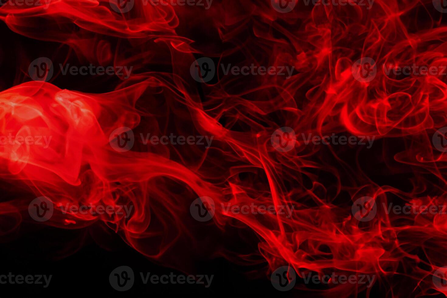 Fluffy Puffs of Smoke and Fog on Black Background, fire design and darkness concept photo