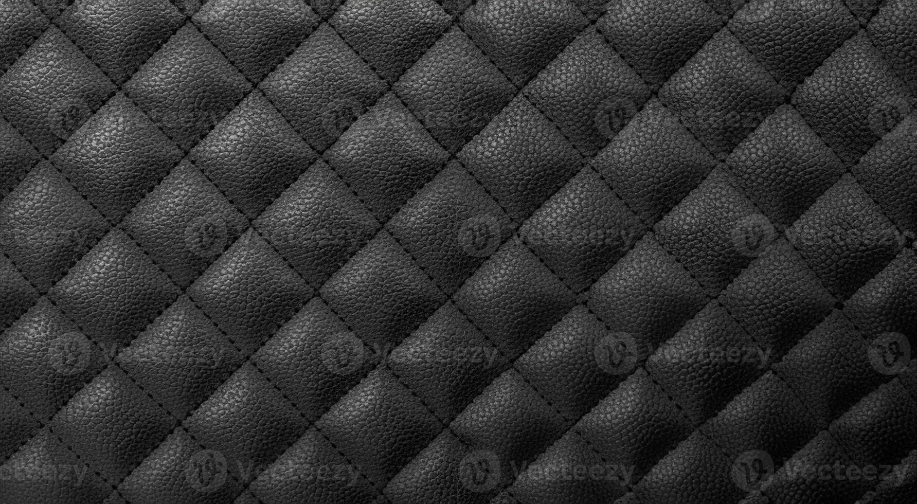 a black leather texture with a diamond pattern photo