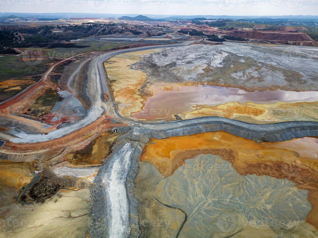 Aerial view of Mining activity. Apocalypse scenery. Earth destruction. Disruption of nature.  Extracting natural resources from the Earth to sell on the world market. Ecological disaster. photo