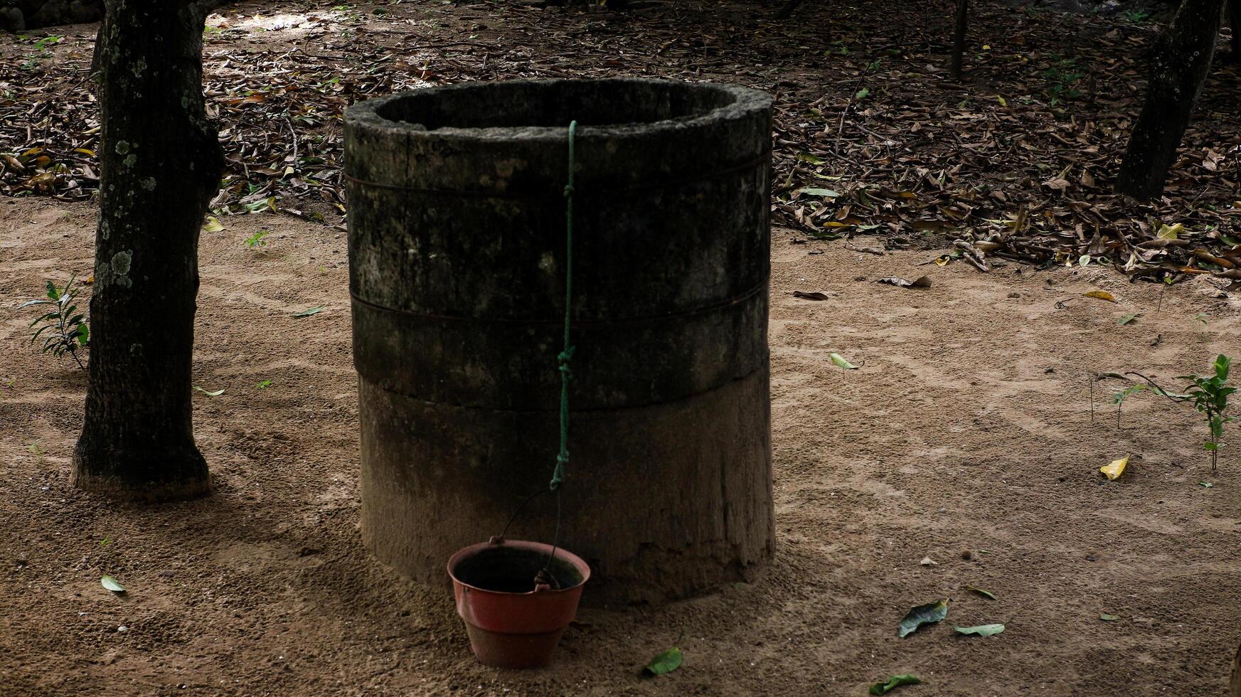 Traditional well where clean water is taken photo