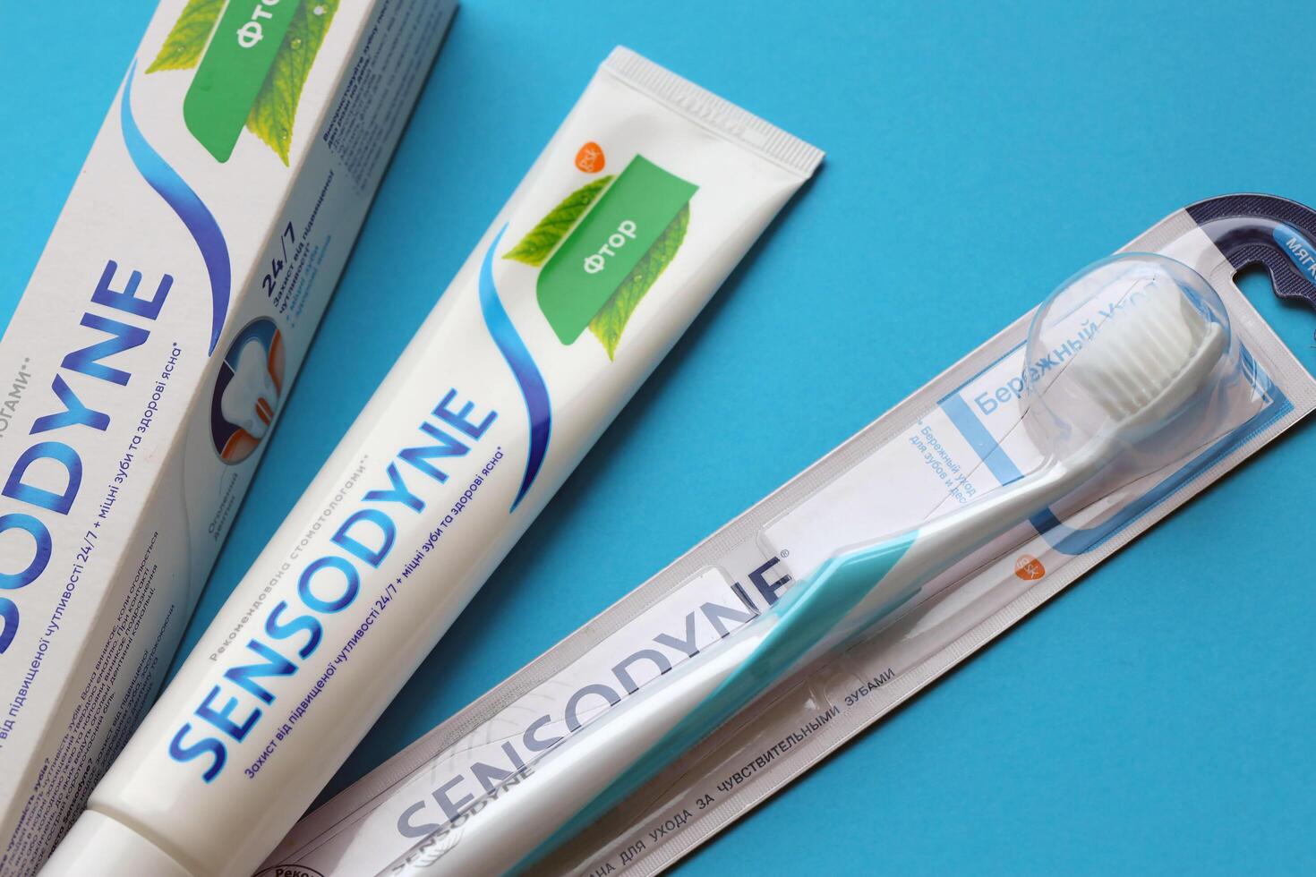 KYIV, UKRAINE - MAY 4, 2022 Sensodyne fluorine or fluor is a daily fluoride toothpaste photo