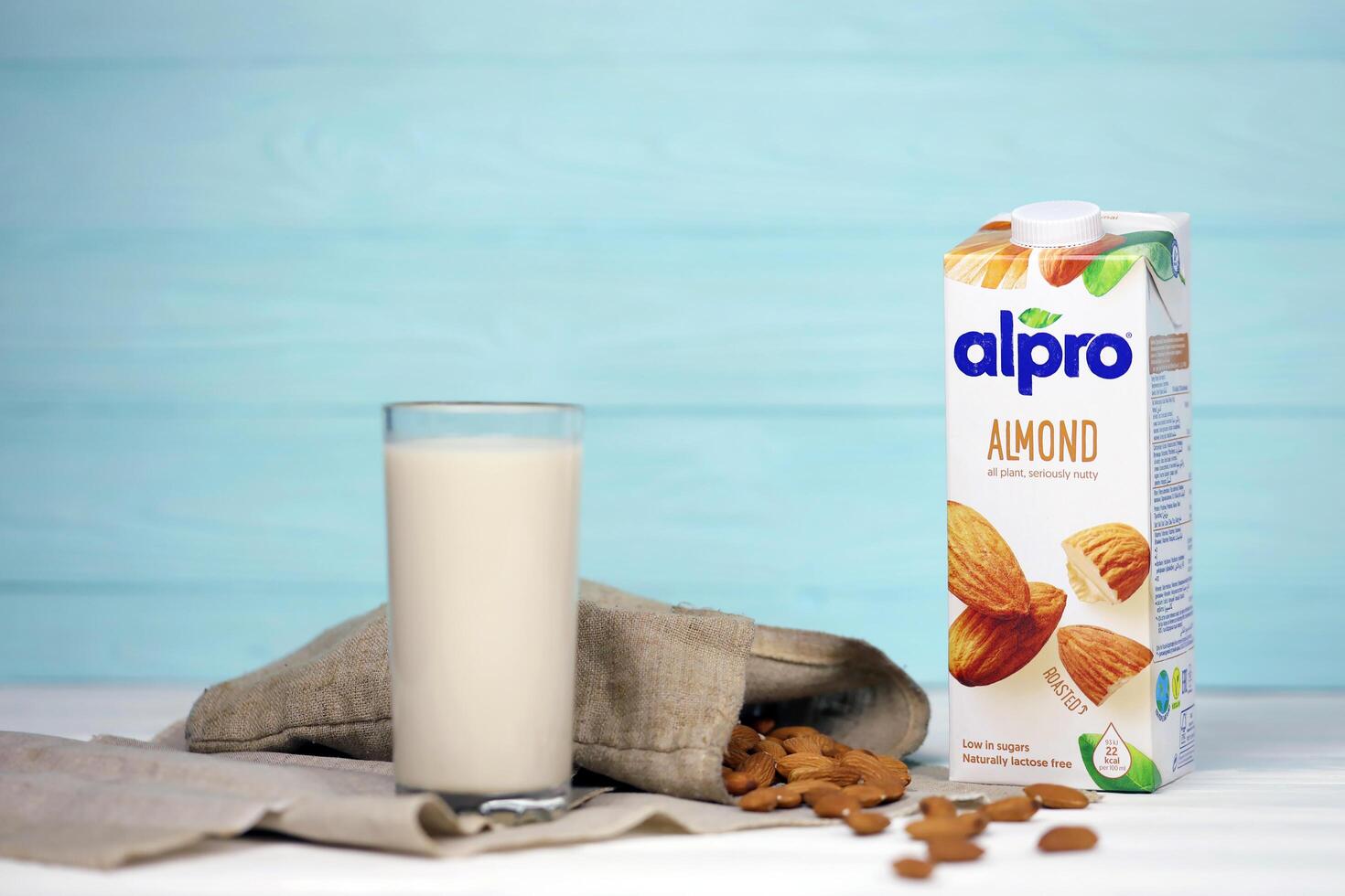 KHARKIV, UKRAINE - JANUARY 2, 2021 Alpro almond vegetarian milk pack produced by European company based in Wevelgem photo