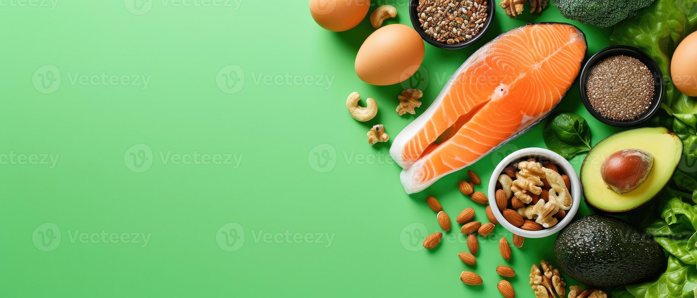 AI generated Concept of a ketogenic diet with ingredients like salmon, avocado, eggs, nuts, and seeds, set against a bright green backdrop, top perspective, Ai Generated. photo