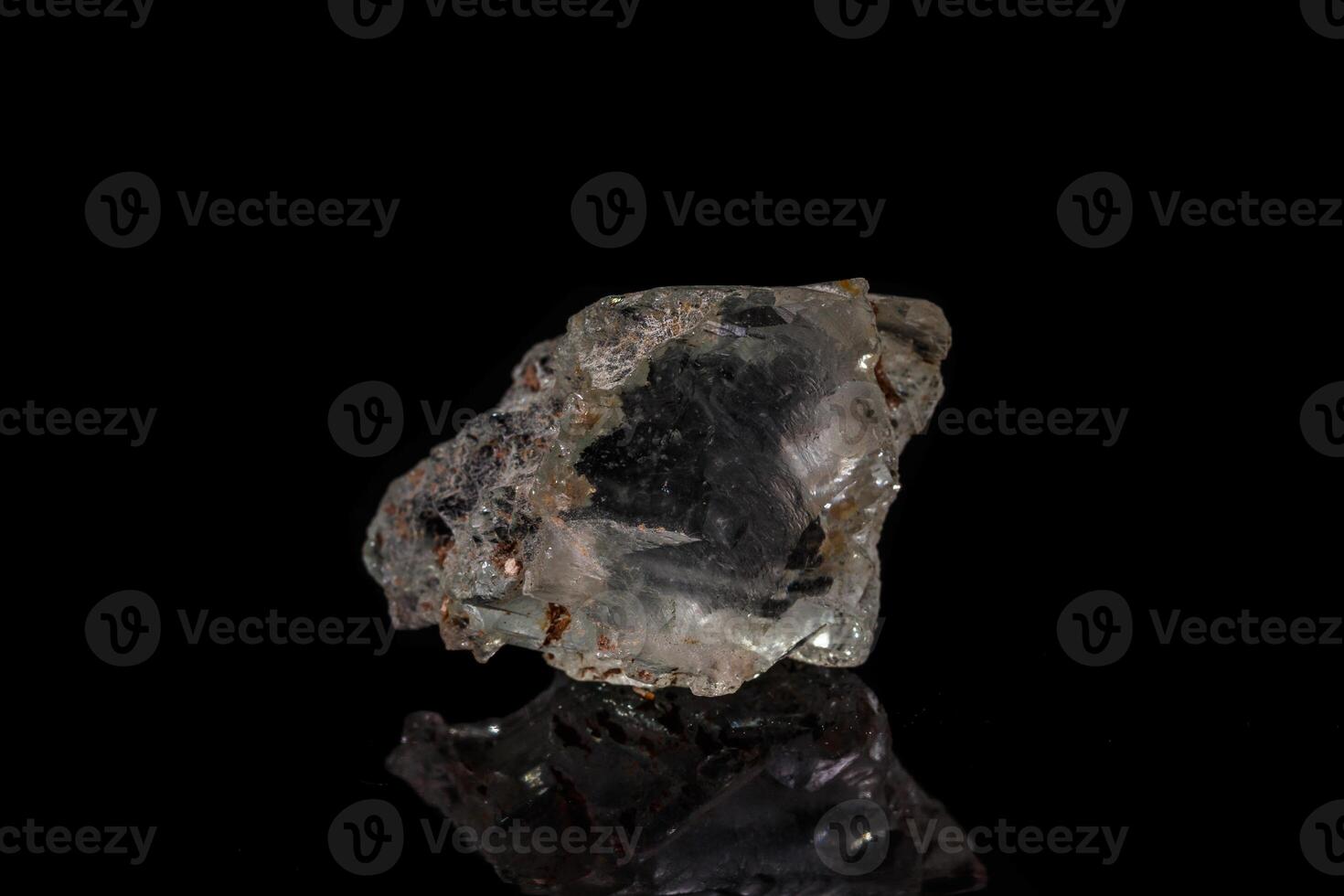 macro mineral stone Topaz on a black background photo