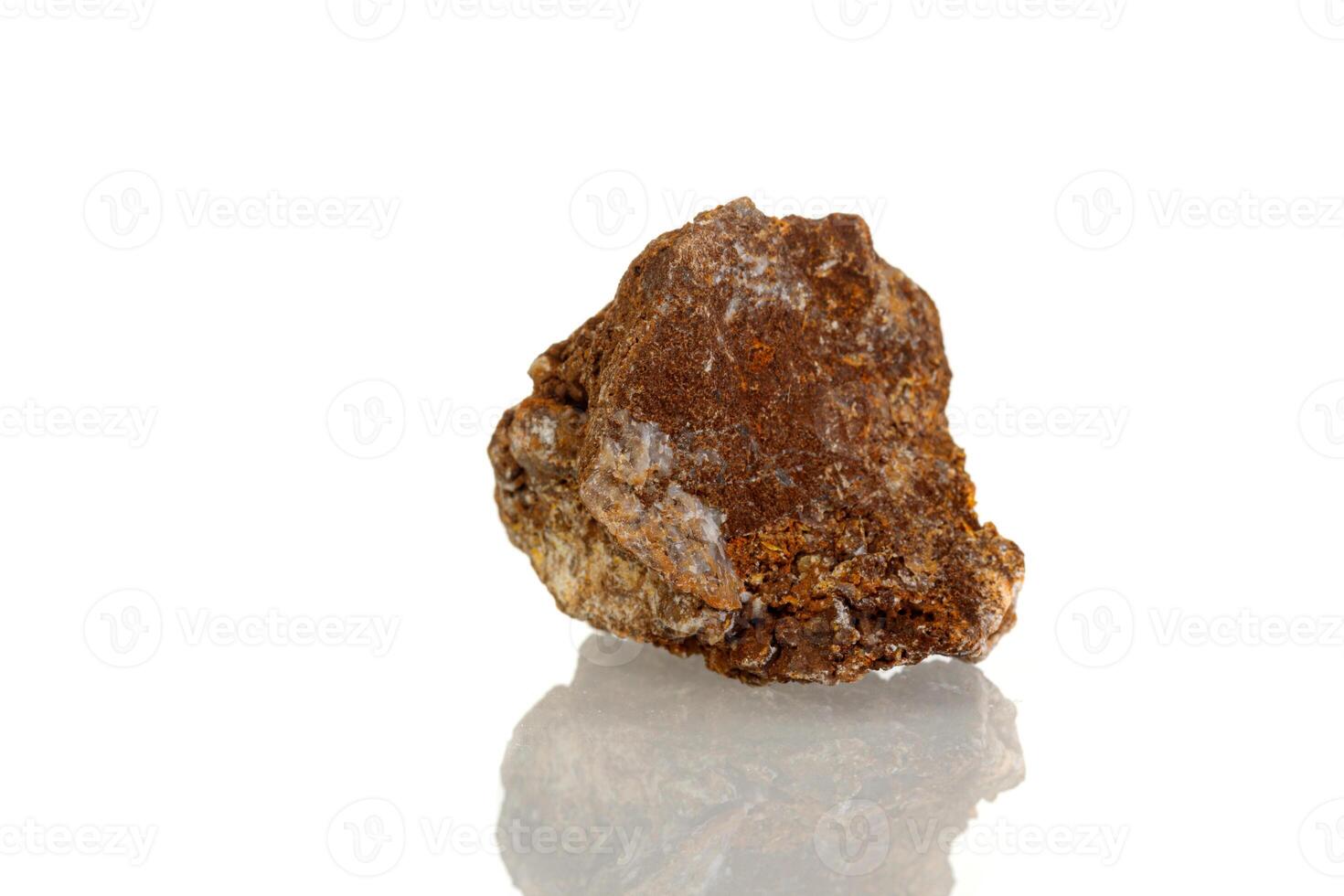 macro mineral stone Wulfenite on a white background photo