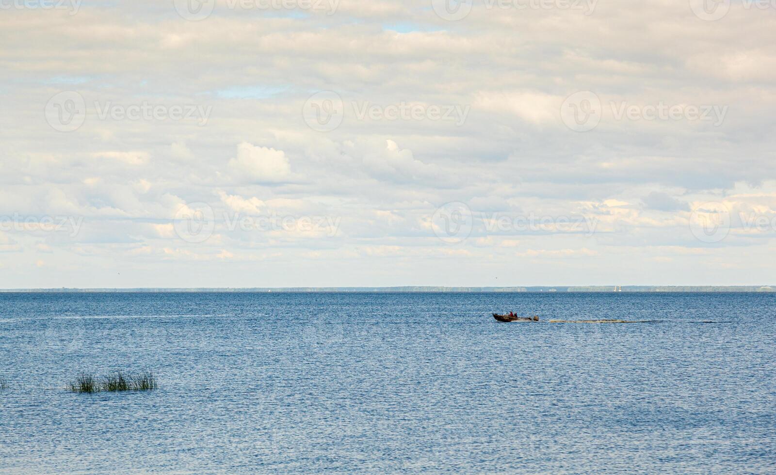beautiful landscape of the sea against the background of a blue sky with clouds photo