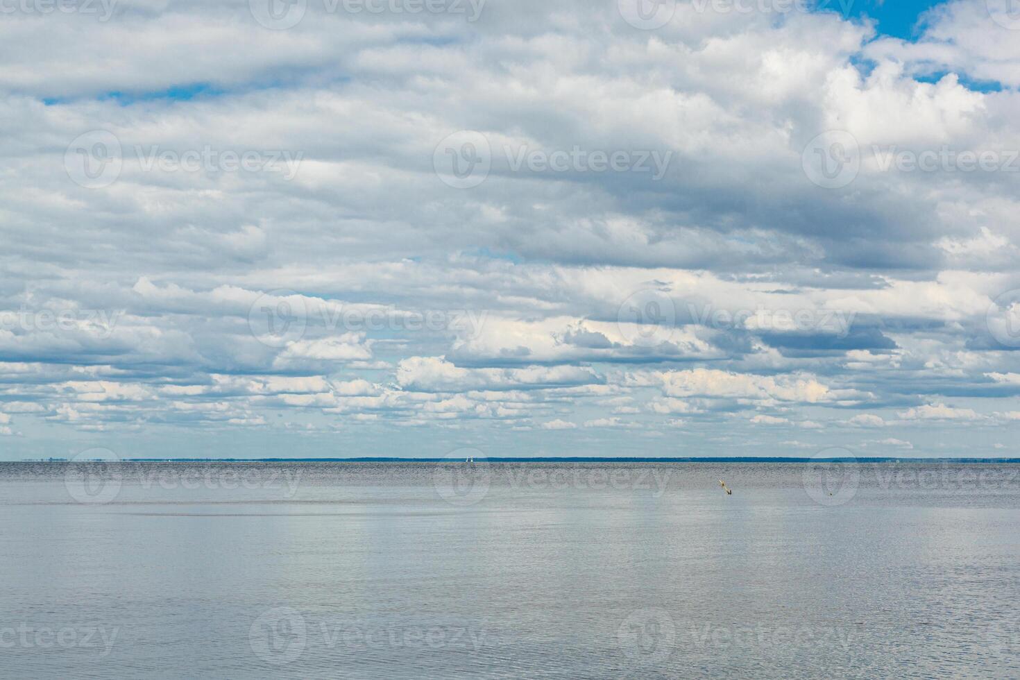 beautiful landscape of the sea against the background of a blue sky with clouds photo