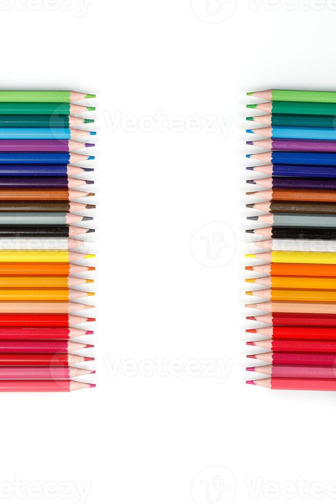 Multi-colored pencils in a row photo