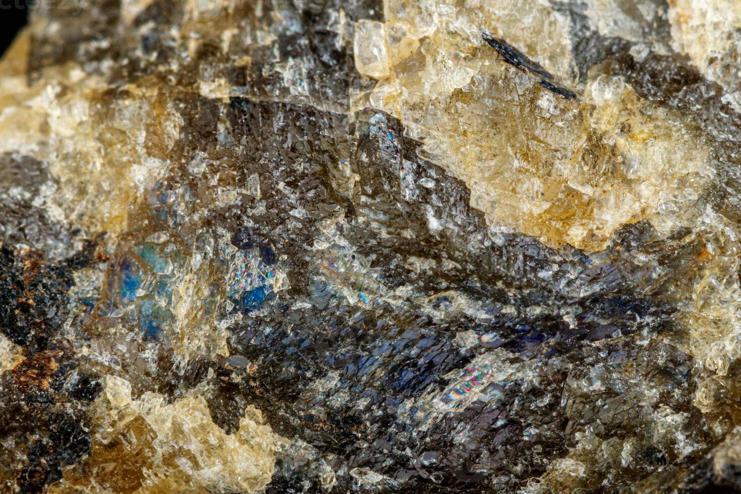macro mineral stone Labradorite on a black background photo